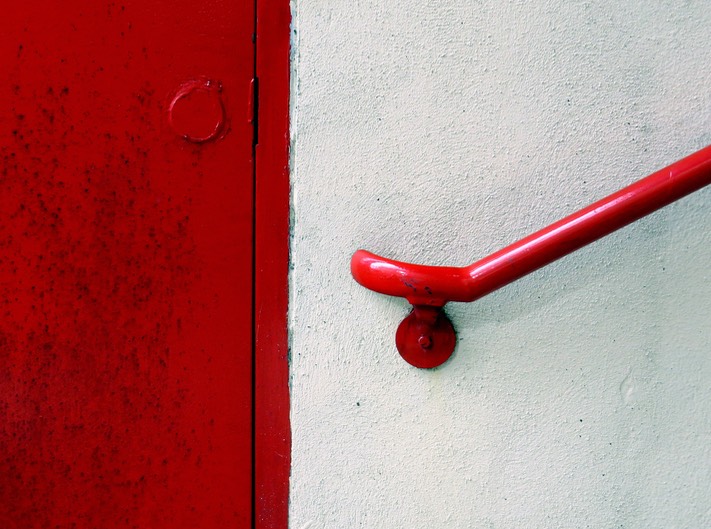 Red Door and Railing, by Richard Fredericksen